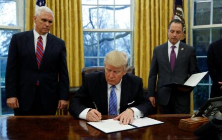President Trump signs executive orders at the White House in Washington